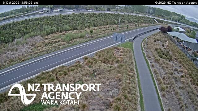 The road at SH74 QEII Dr Roundabout South, live