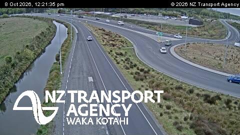 The road at SH74 QEII Dr Roundabout North, live